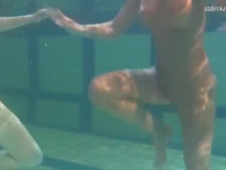 Superb Chicks Irina and Anna Swim Naked in the Pool